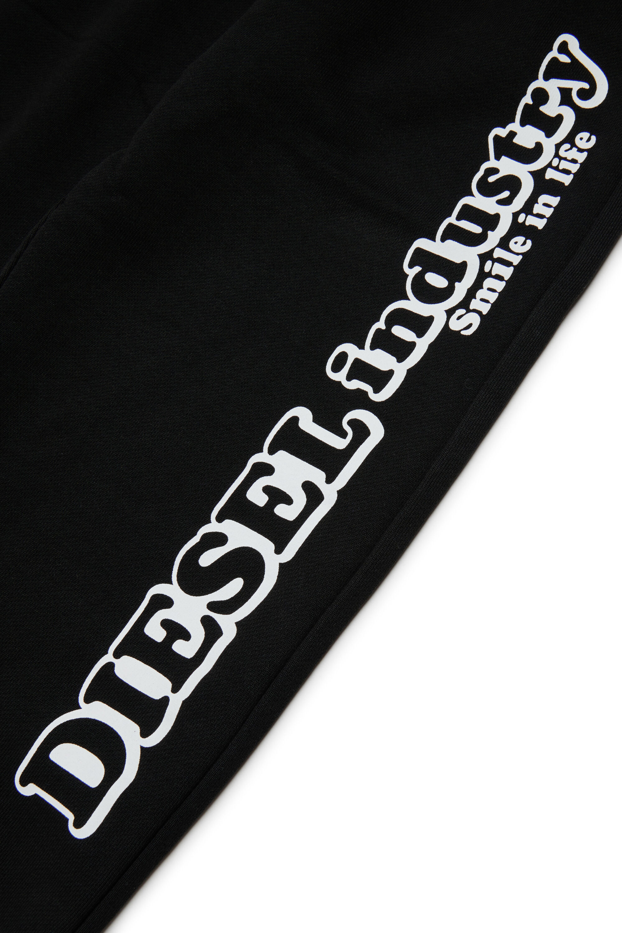 Diesel - PLODIM, Pantaloni in cotone con stampa Diesel Industry Uomo in Nero - 4