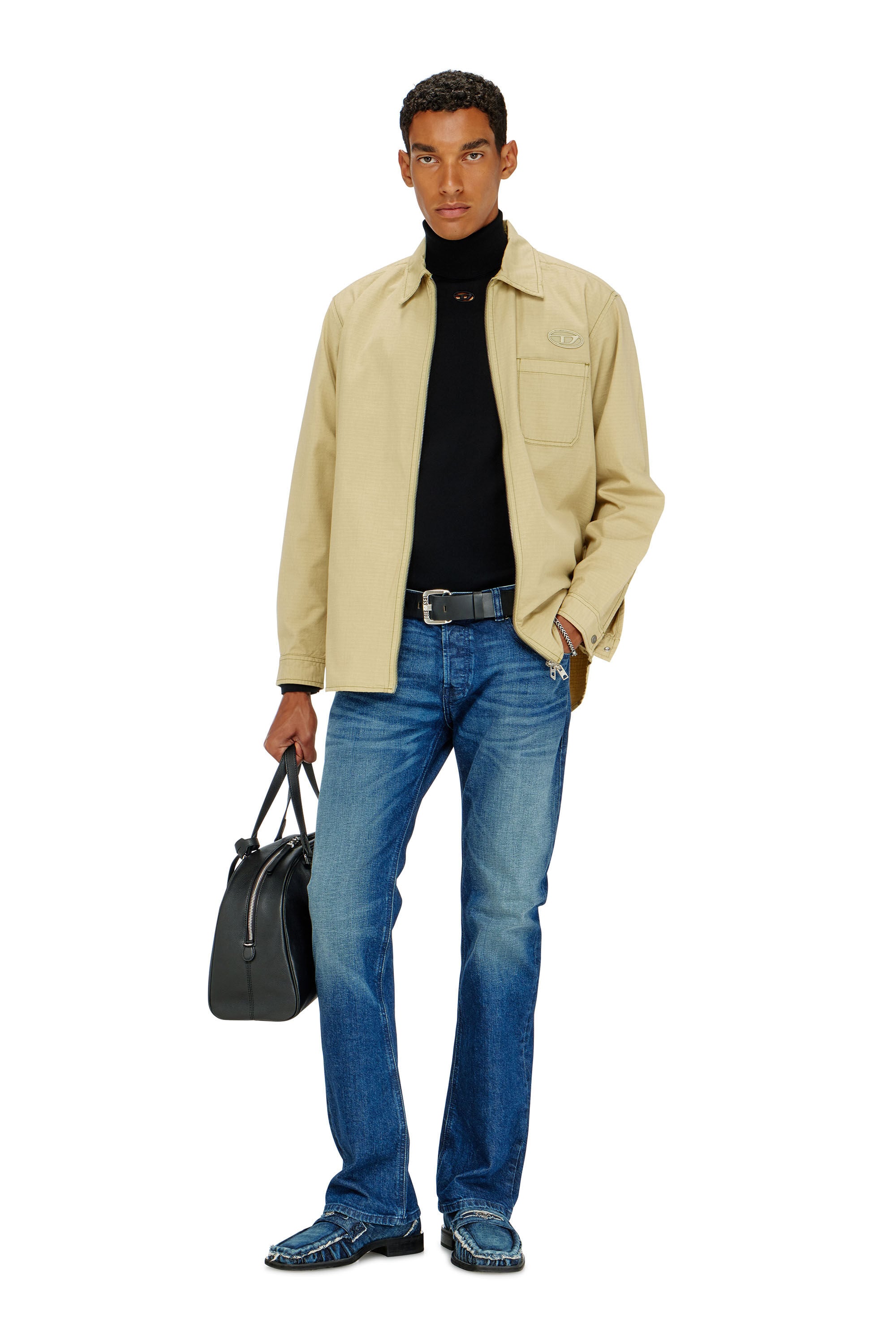 Diesel - K-VARTA, Dolcevita in lana con logo cut-out Uomo in Nero - 1