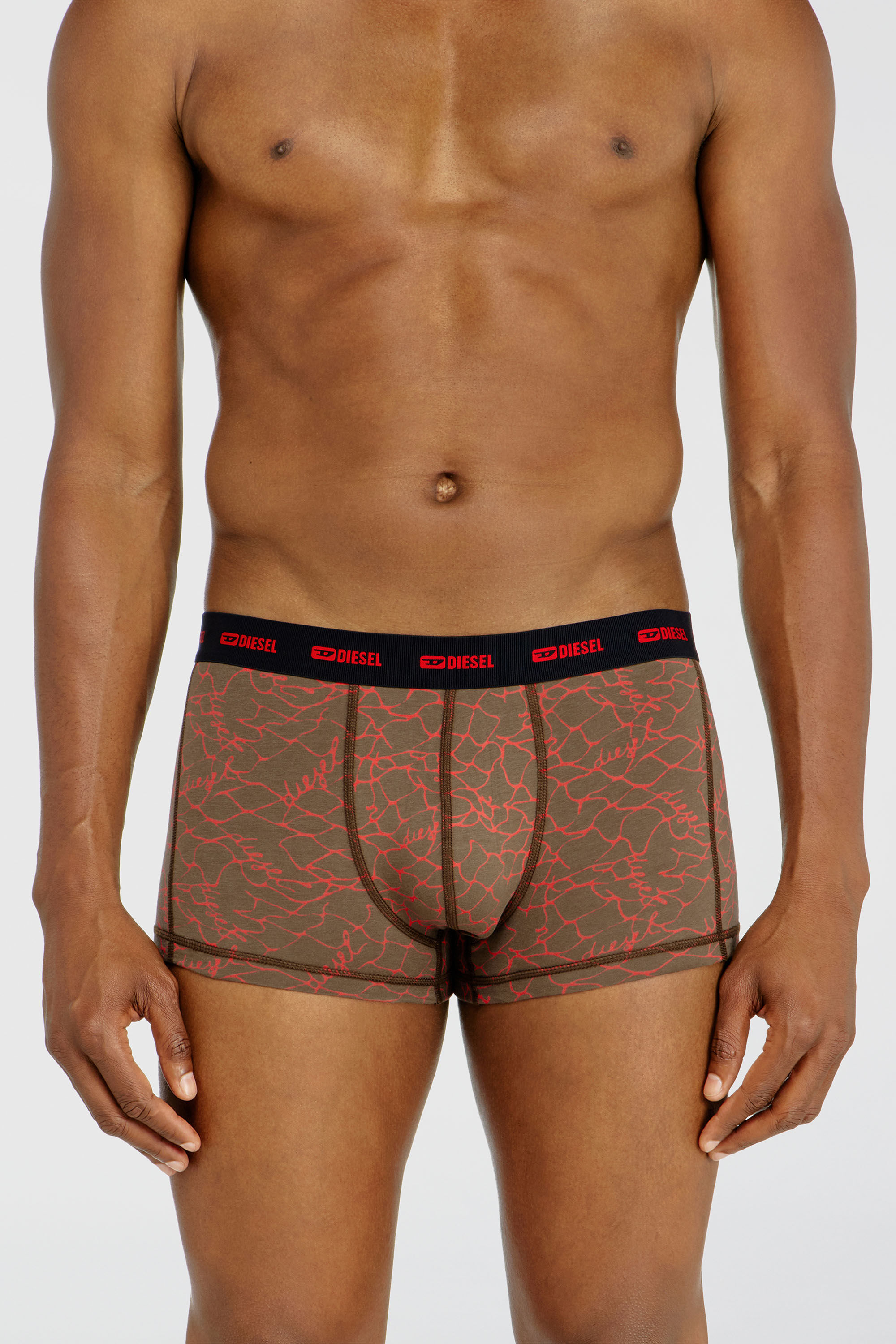 Diesel - DAMIEN-UTLT-3PACK, Herren Dreierpack Trunks mit grafischem Motiv in Schwarz/Braun - 3