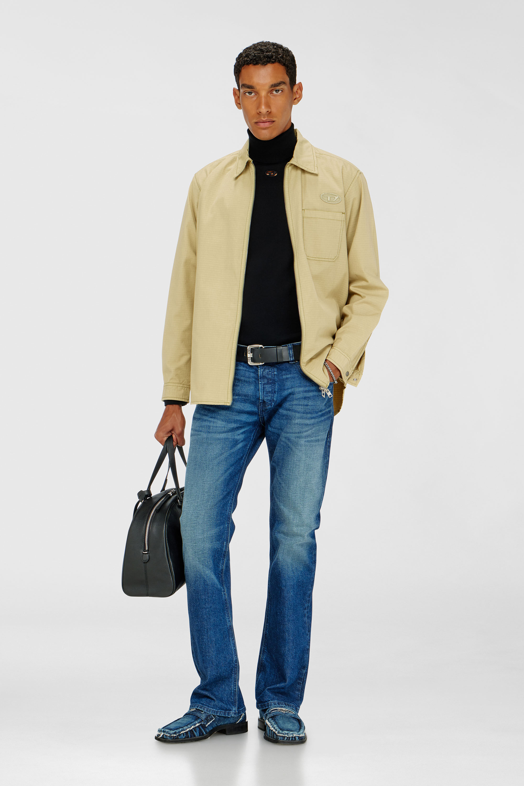Diesel - K-VARTA, Dolcevita in lana con logo cut-out Uomo in Nero - 1
