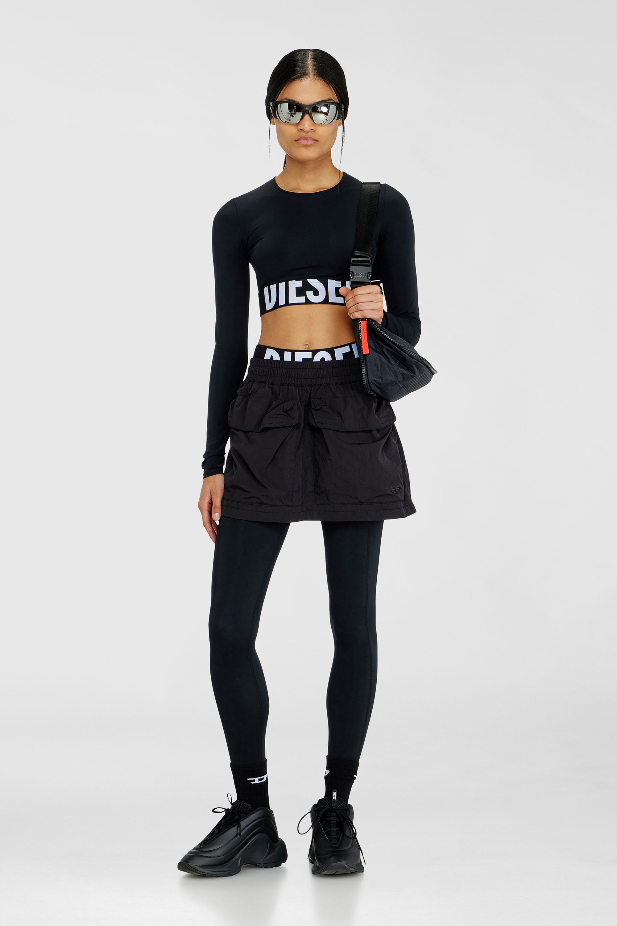 Diesel - MELISSA-D-POP, Crop top in microfibra con logo tagliato Donna in Nero - 6