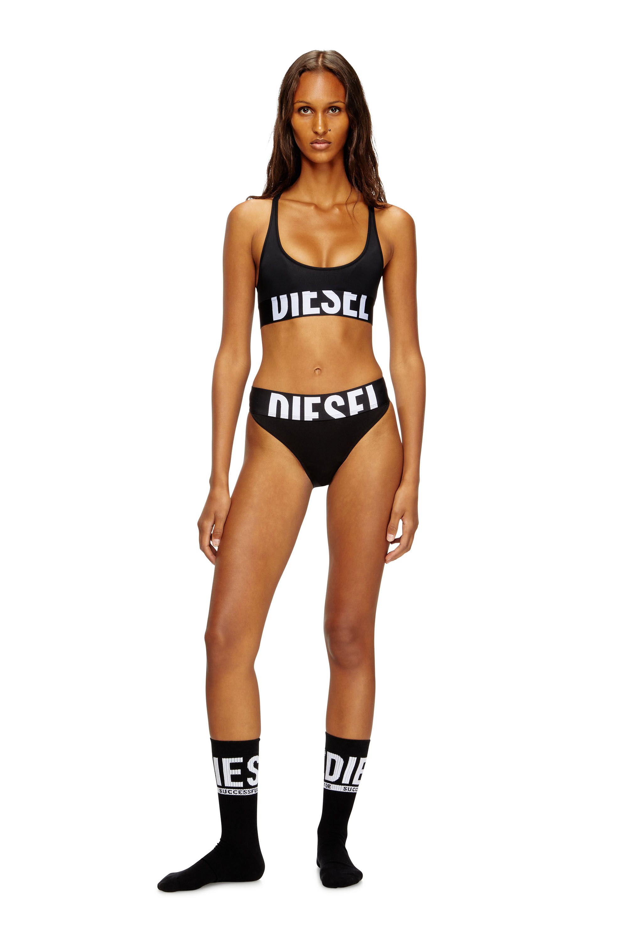 Diesel - ALLISON-D-POP, Reggiseno sportivo con logo tagliato Donna in Nero - 1