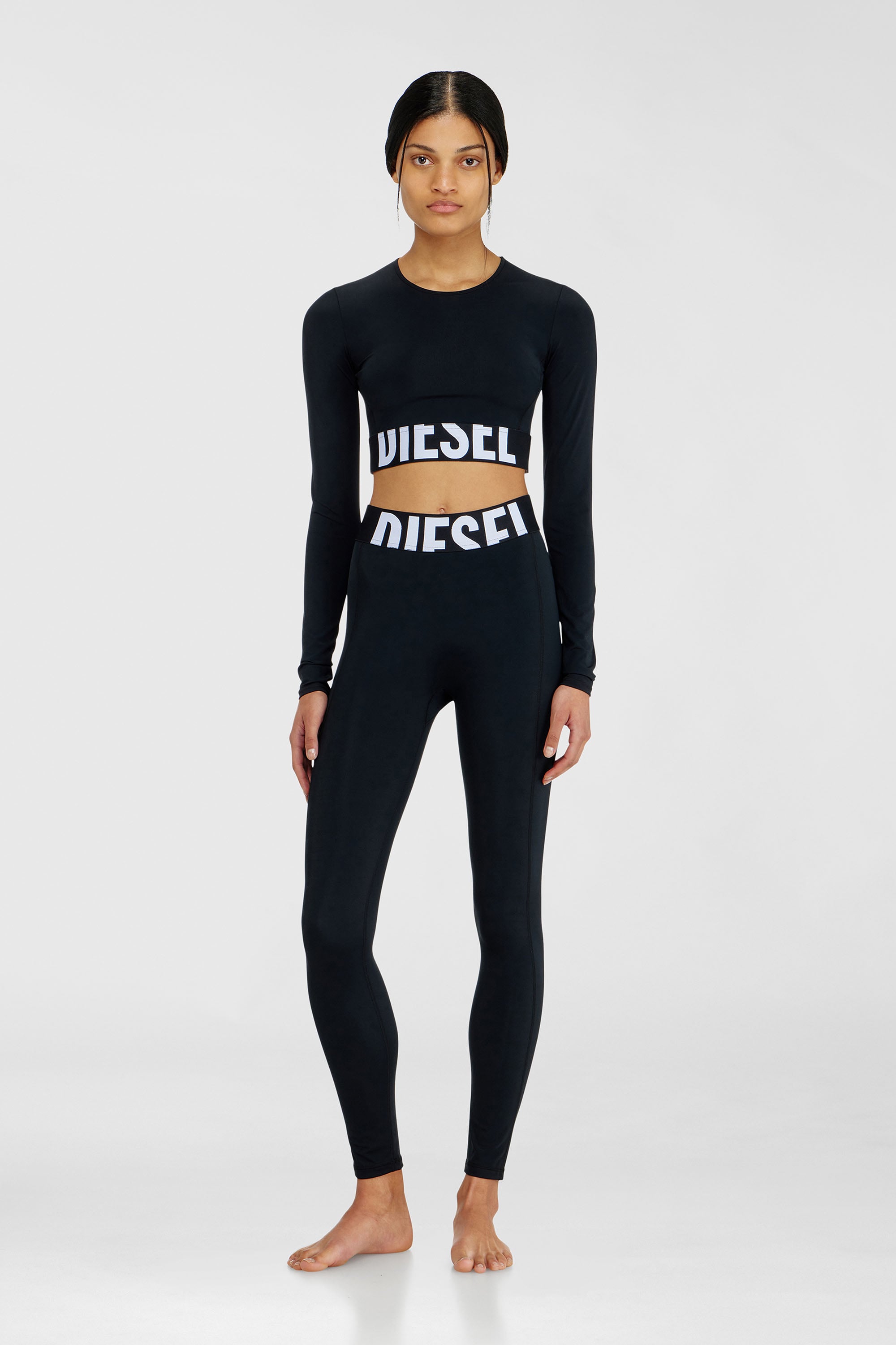 Diesel - ADELINE-D-POP, Leggings in microfibra con logo tagliato Donna in Nero - 2