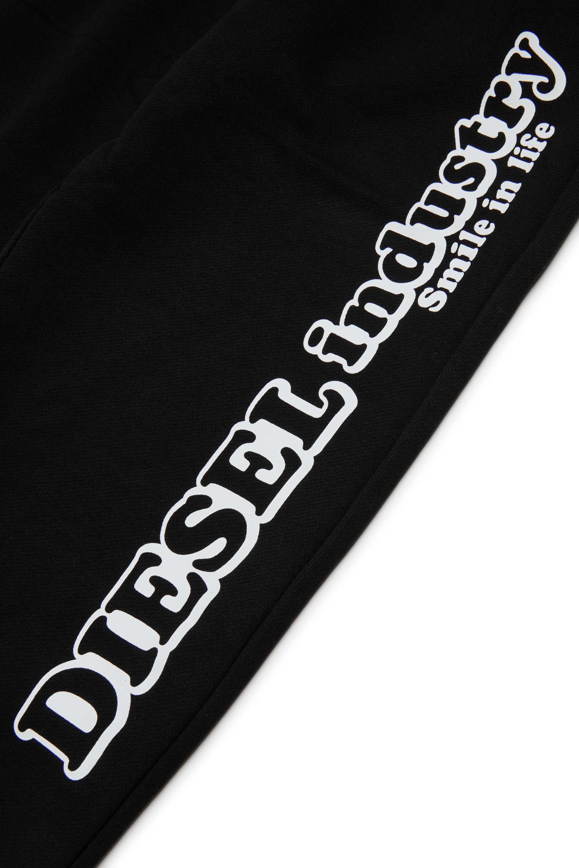 Diesel - PLODIM, Pantaloni in cotone con stampa Diesel Industry Uomo in Nero - 4