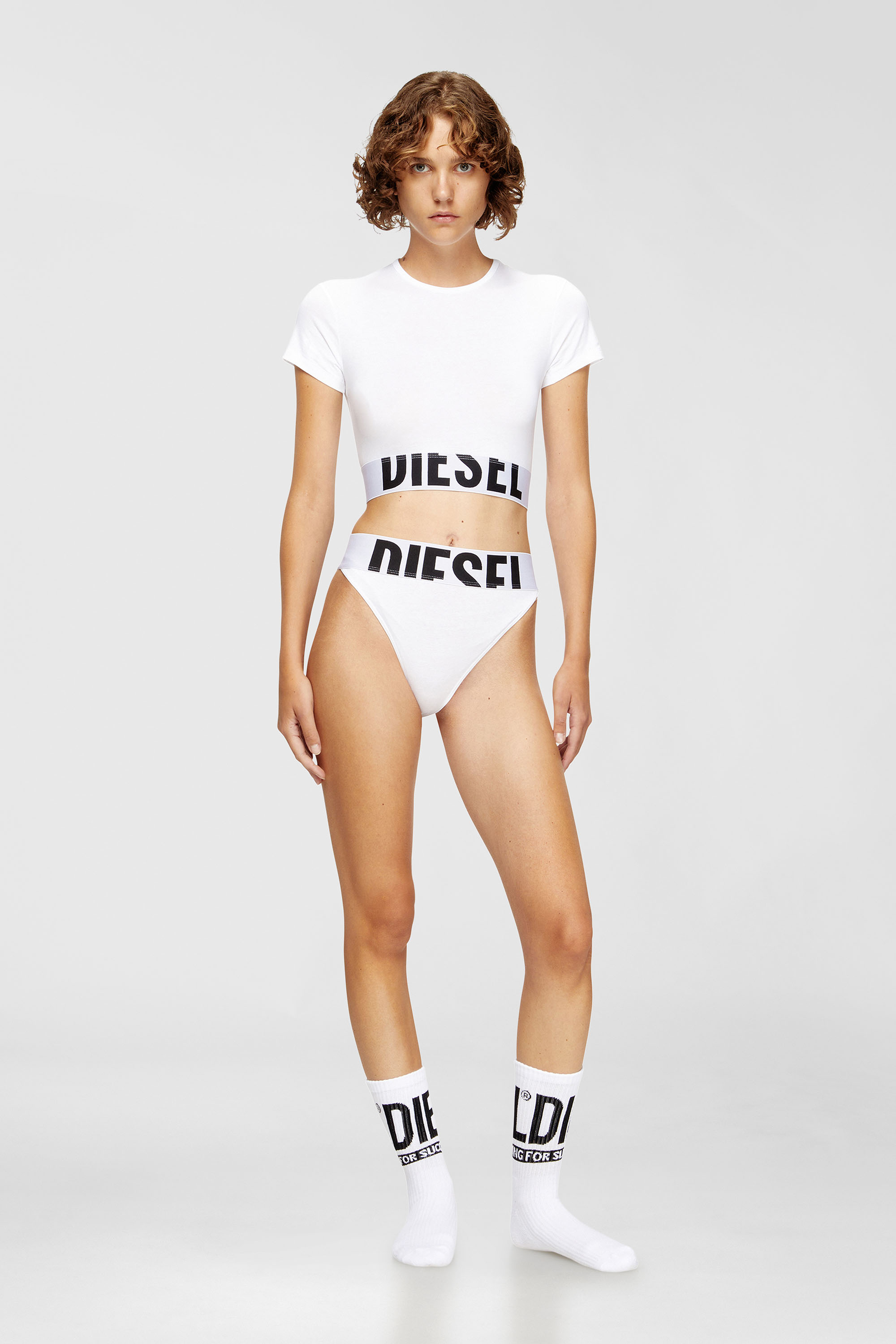 Diesel - UFTEE-SPORT-CROPPED-T-SHIRT, Crop top sportivo con fascia logo Donna in Bianco - 1