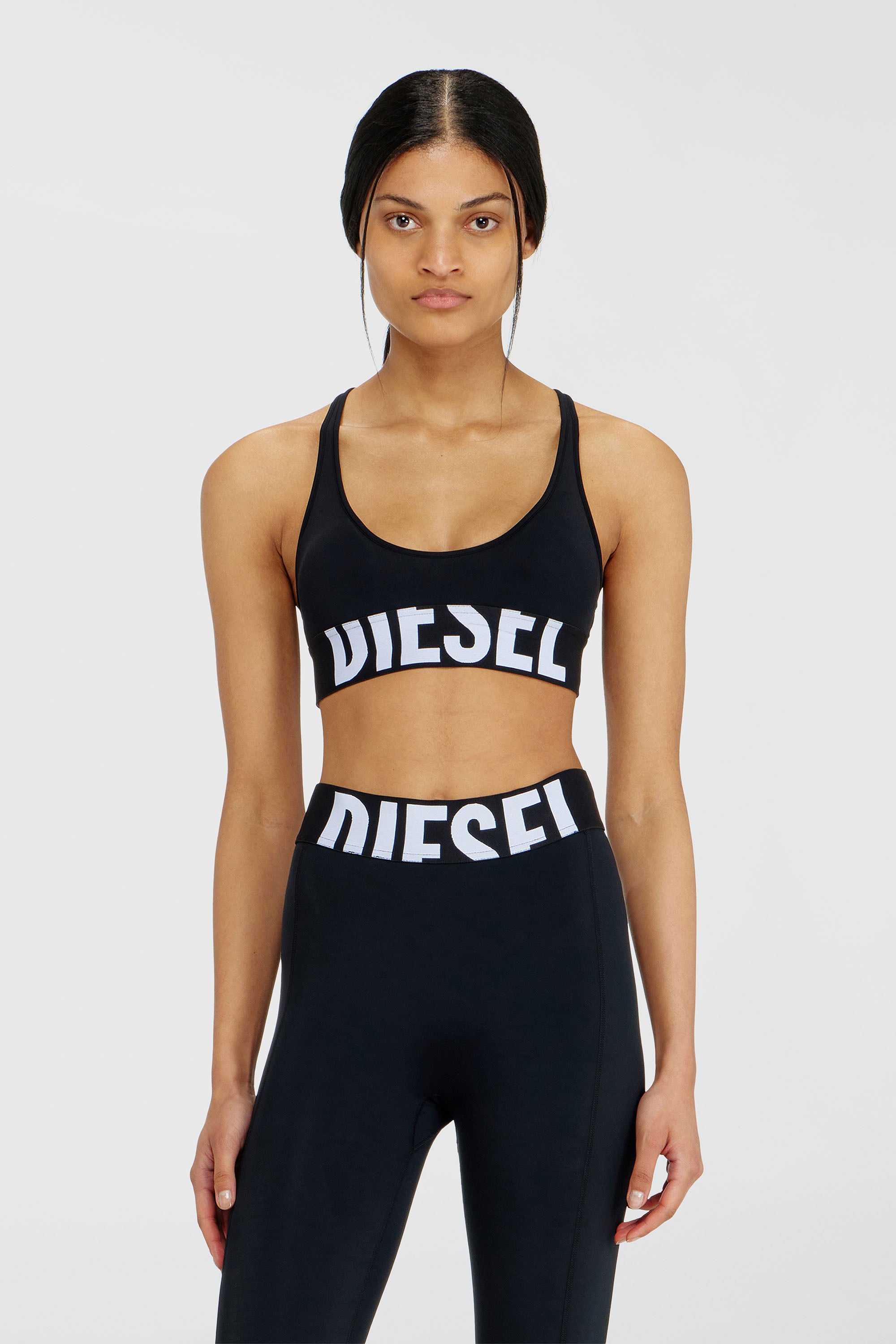 Diesel - ALLISON-D-POP, Reggiseno sportivo con logo tagliato Donna in Nero - 2