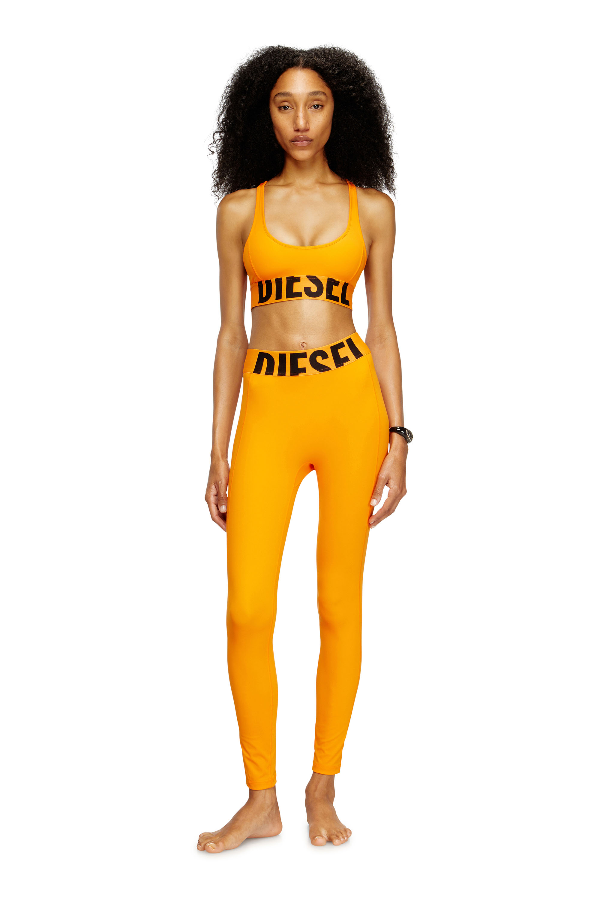 Diesel - ADELINE-D-POP, Leggings en microfibre avec logo tronqué Femme in Orange - 1