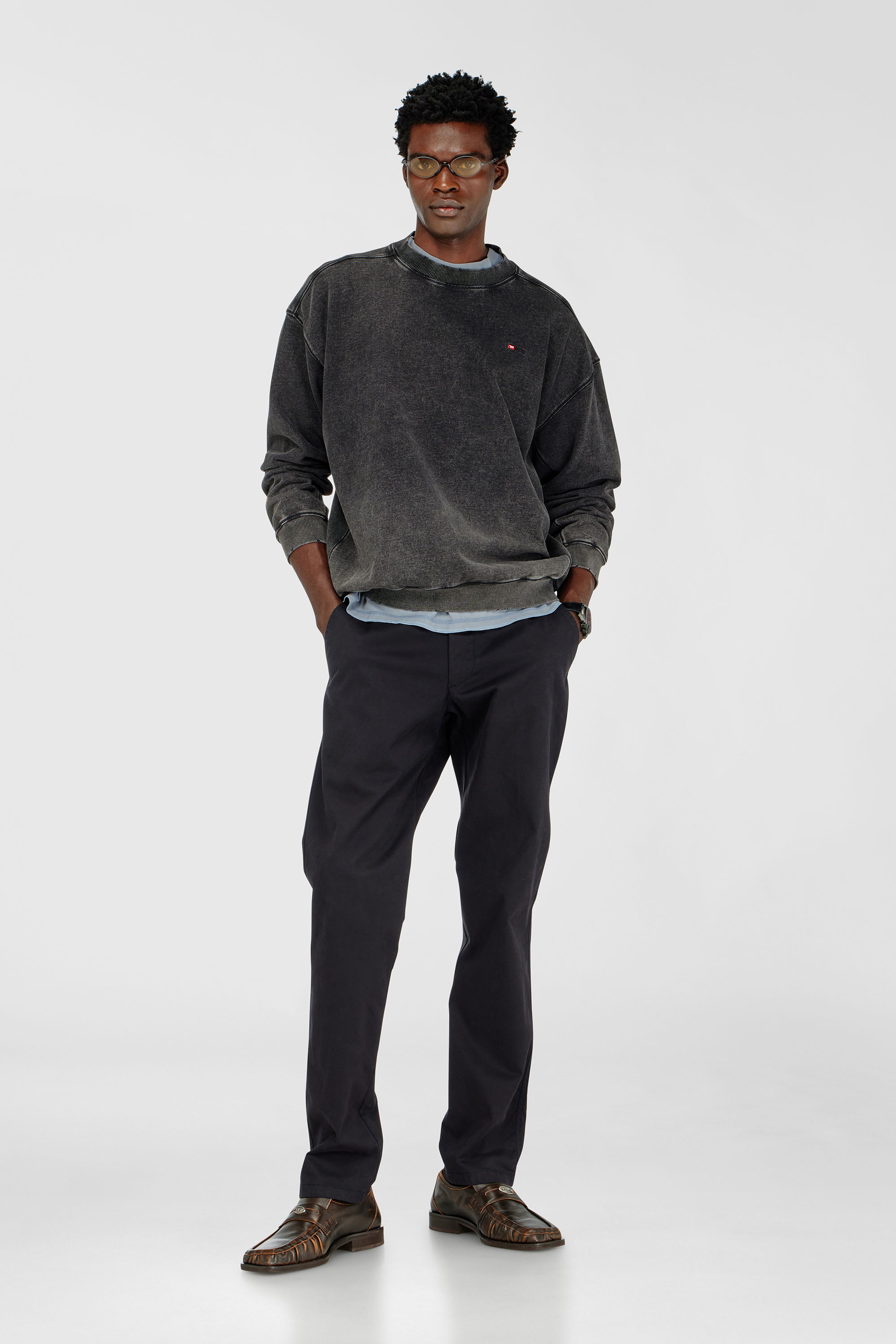 Pantaloni in cotone con passante utility