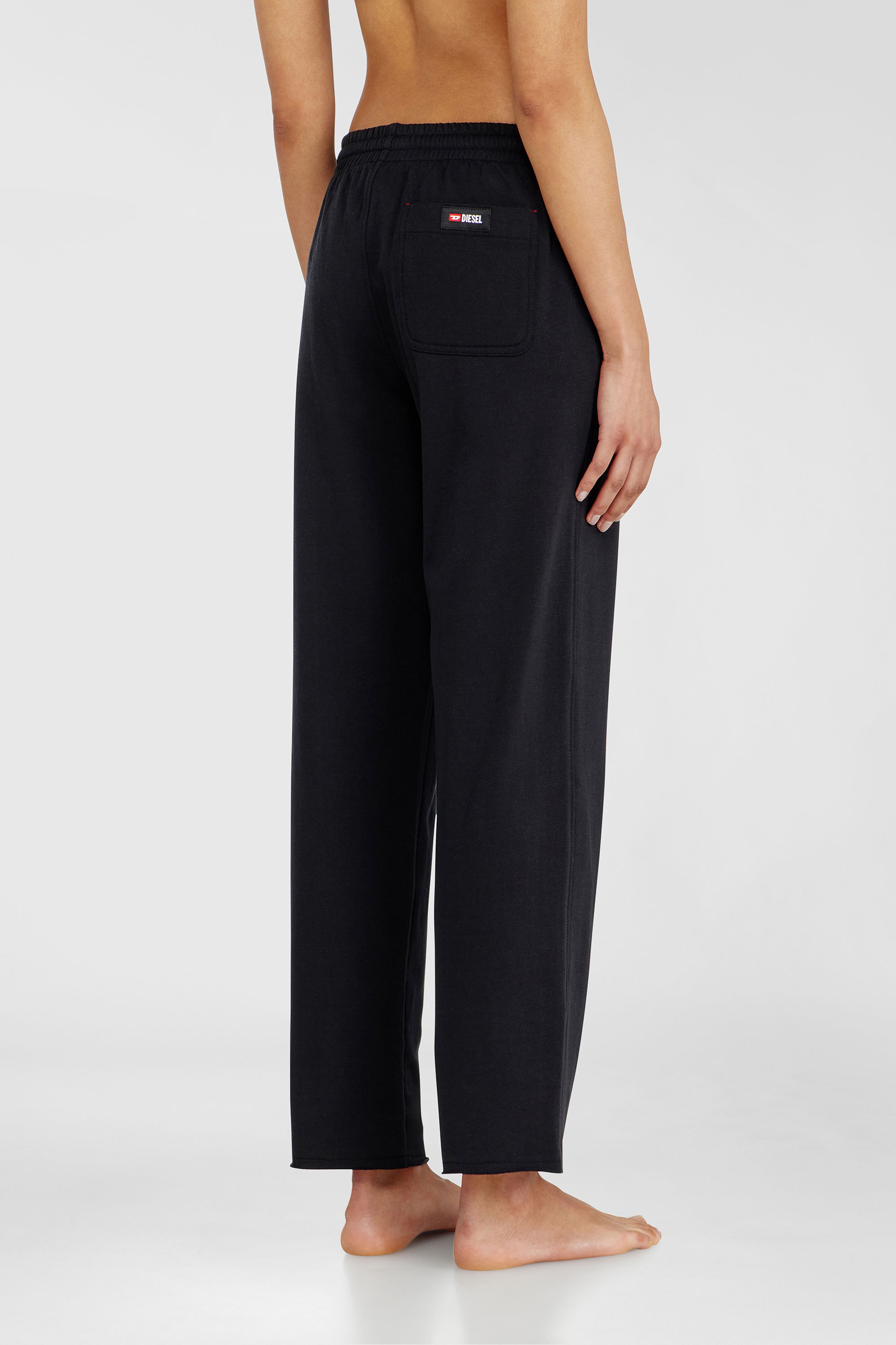 Diesel - INDRA-D-CORE, Pantaloni felpati smerigliati con orli vivi Donna in Nero - 4