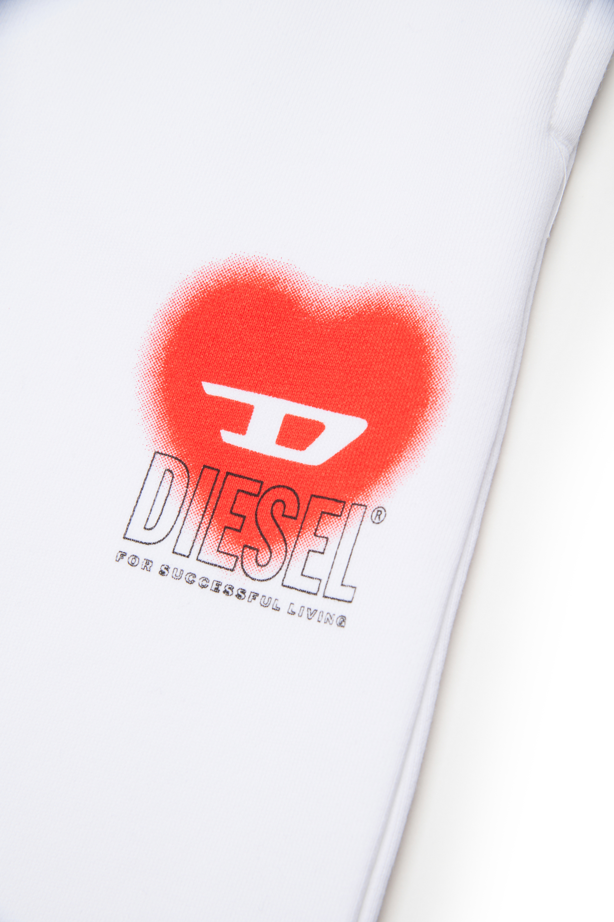 Diesel - PCUORE, Pantaloni tuta con grafica della D sul cuore Donna in Bianco - 4