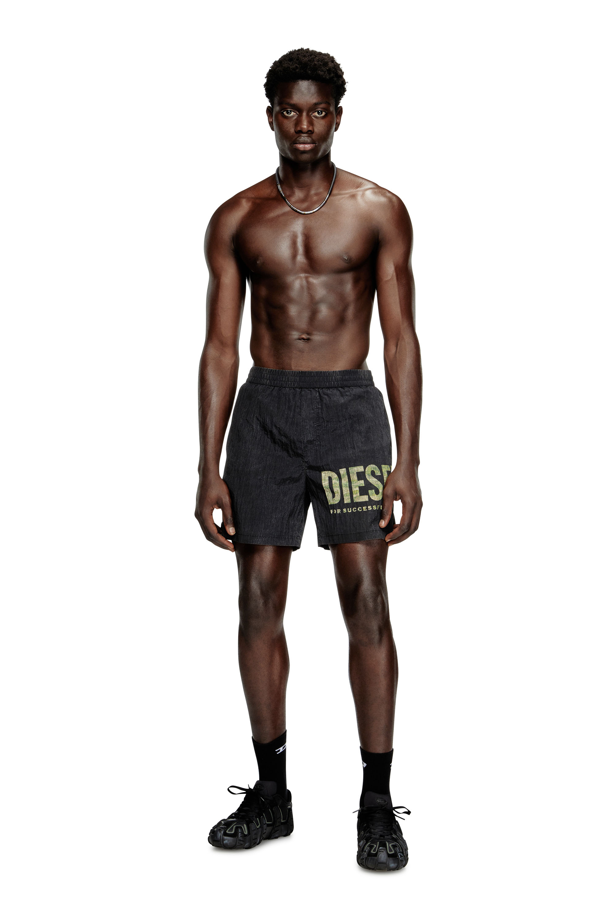 Diesel - RIO-41-UTLT, Herren Mittellange Badeshorts aus Camo-Ripstop in Schwarz/Grün - 1
