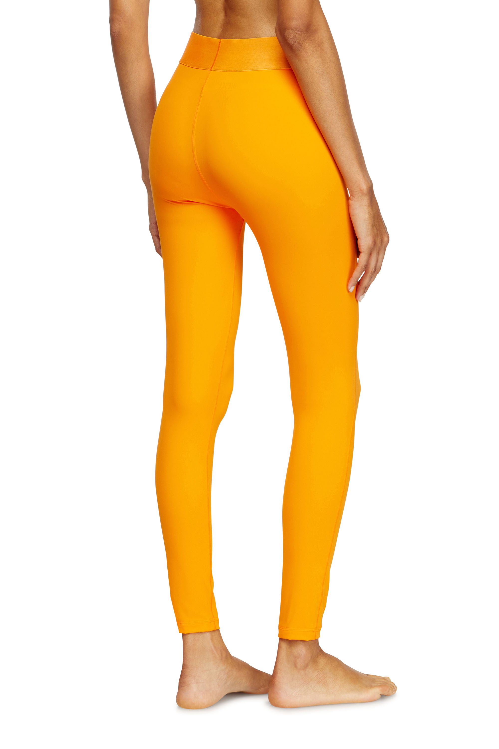 Diesel - ADELINE-D-POP, Leggings en microfibre avec logo tronqué Femme in Orange - 3