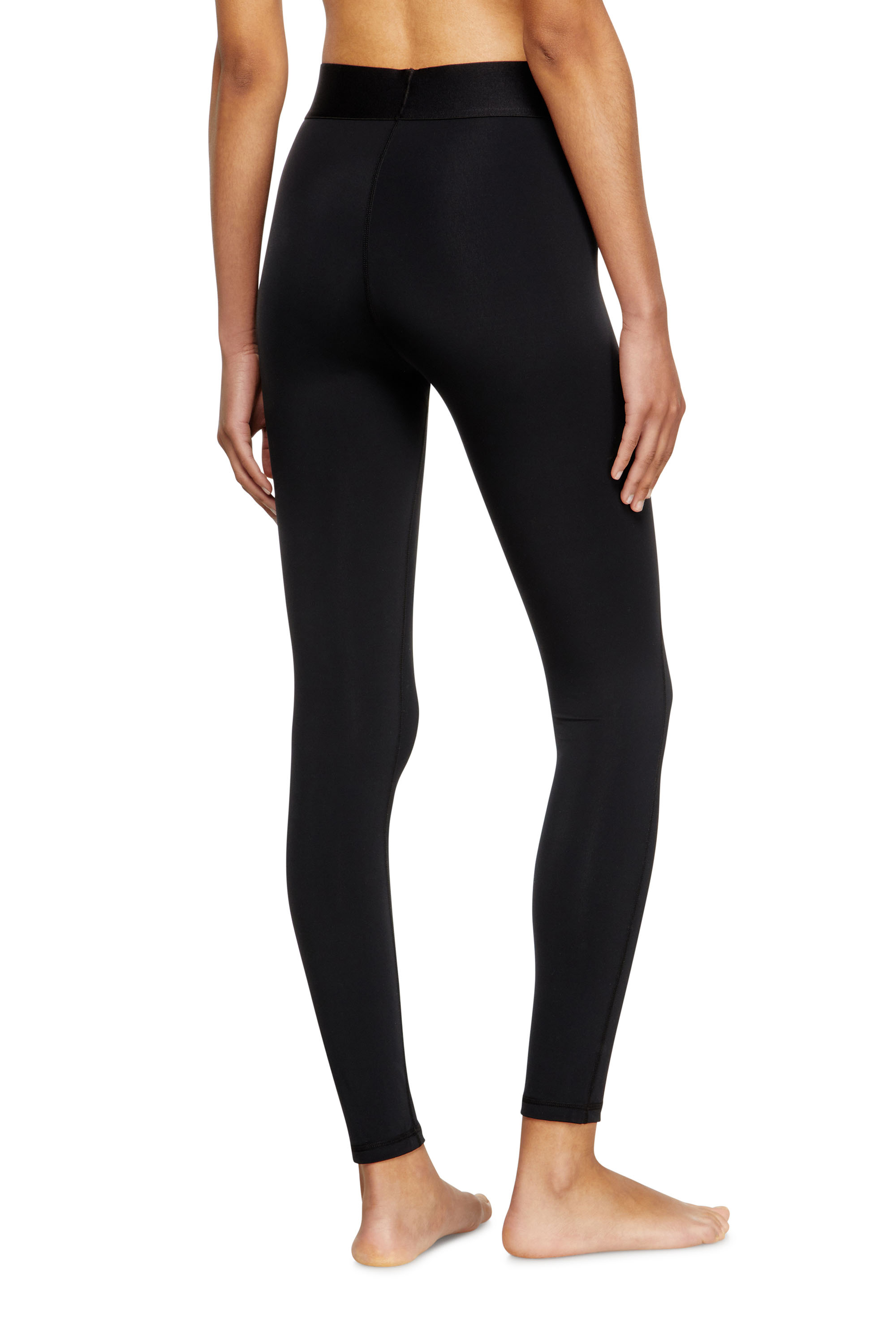 Diesel - ADELINE-D-POP, Leggings in microfibra con logo tagliato Donna in Nero - 4