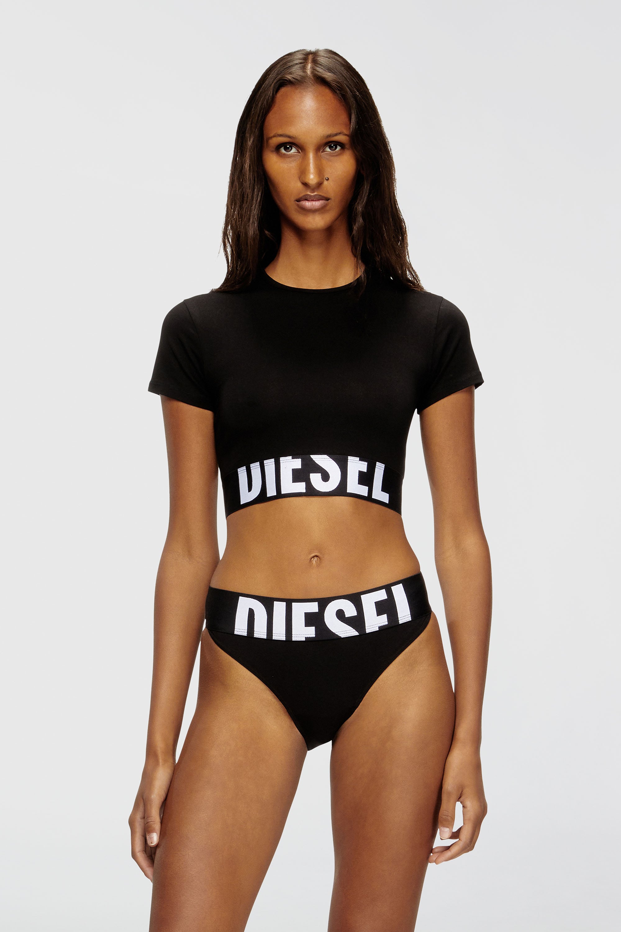 Diesel - UFTEE-SPORT-CROPPED-T-SHIRT, Crop top sportivo con fascia logo Donna in Nero - 1