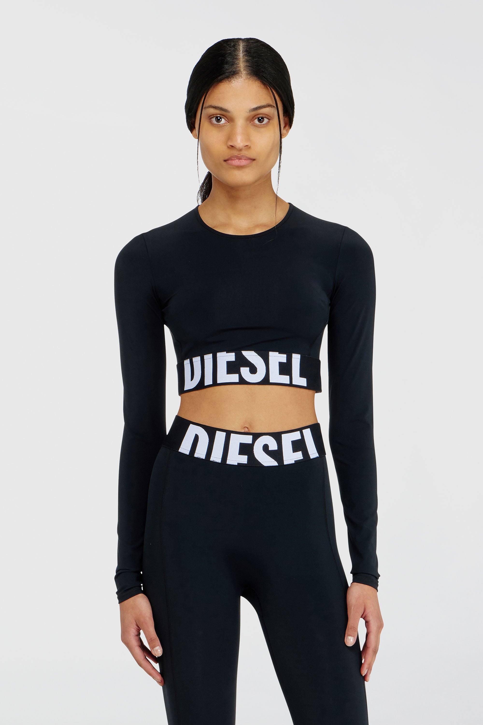 Diesel - MELISSA-D-POP, Crop top in microfibra con logo tagliato Donna in Nero - 1