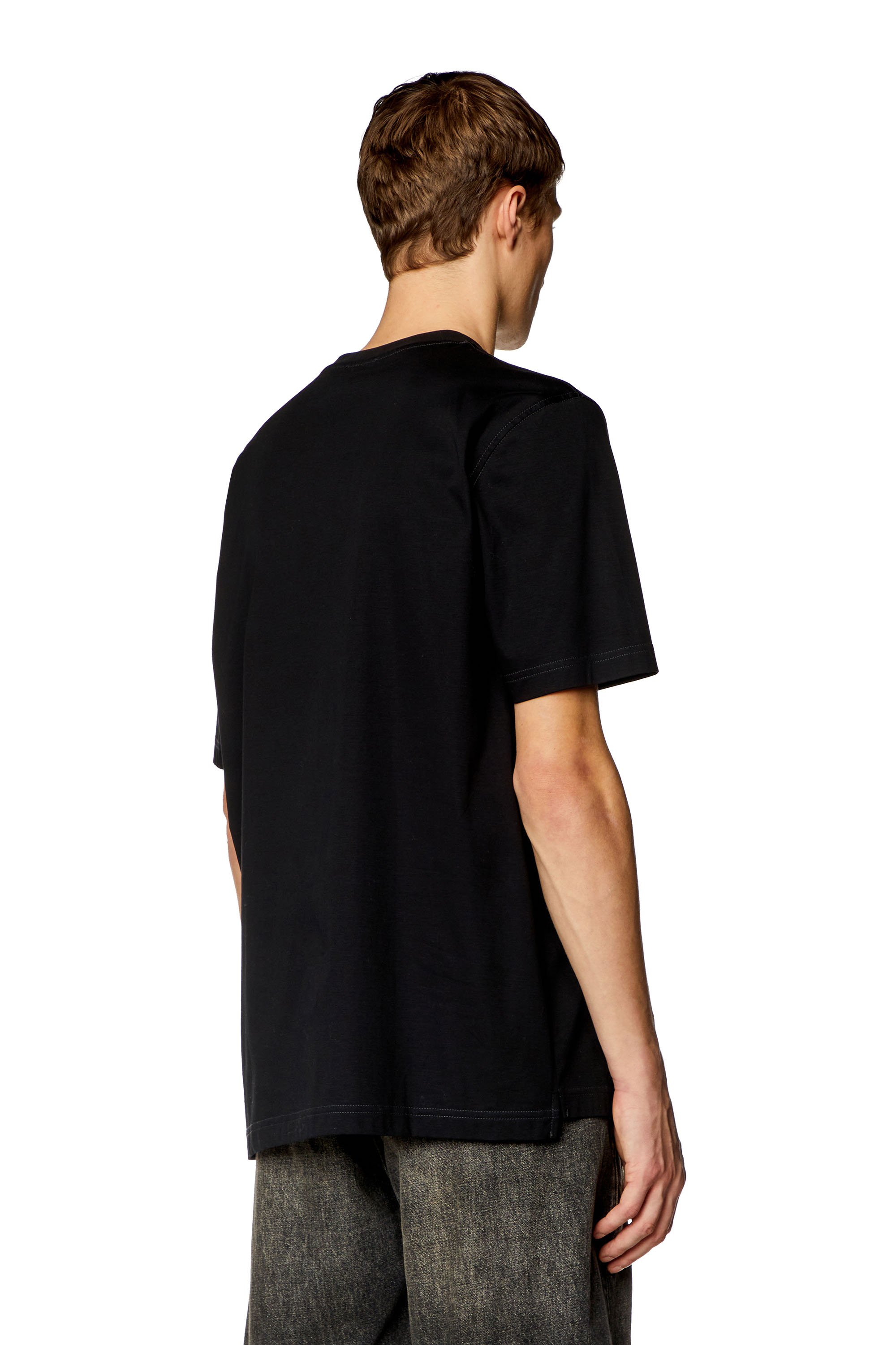 Diesel - T-MUST-SLITS-N2, Man T-shirt with Diesel Studio print in Black - Image 4