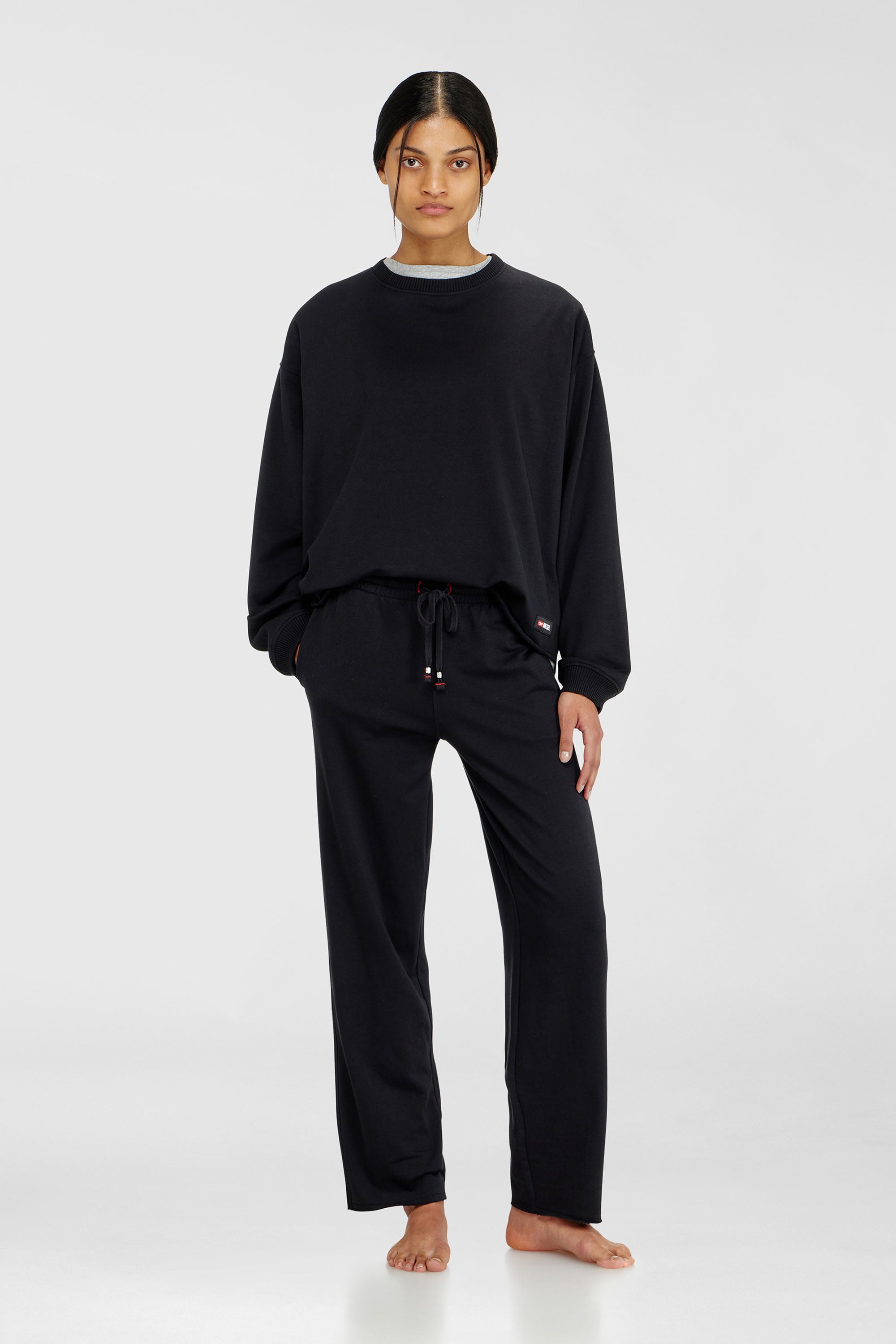 Diesel - INDRA-D-CORE, Pantaloni felpati smerigliati con orli vivi Donna in Nero - 2