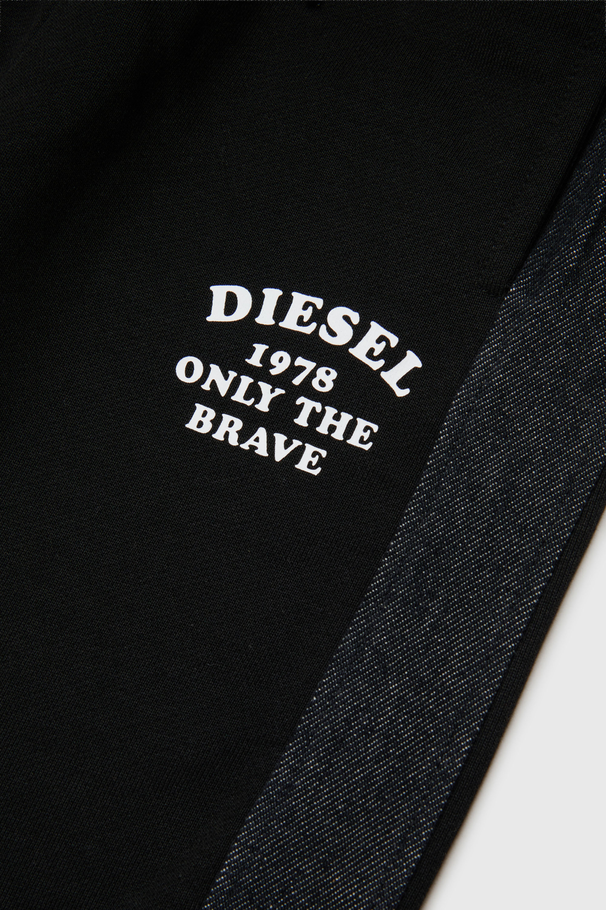 Diesel - PTEAN, Pantaloni da tuta con bande laterali in denim Uomo in Nero - 4